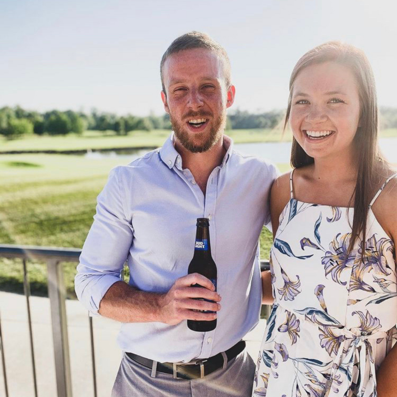 Katie Smith posing with her husband