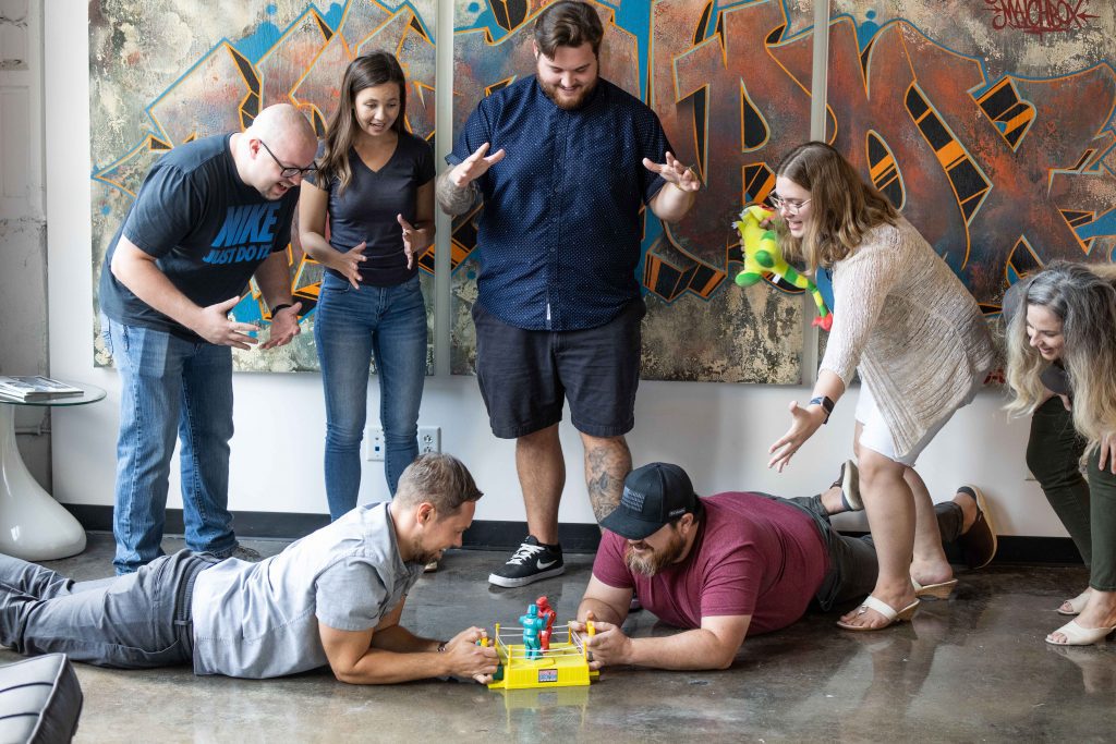 Image of the Matchbox team having fun and about to play a game. Learn about our careers.