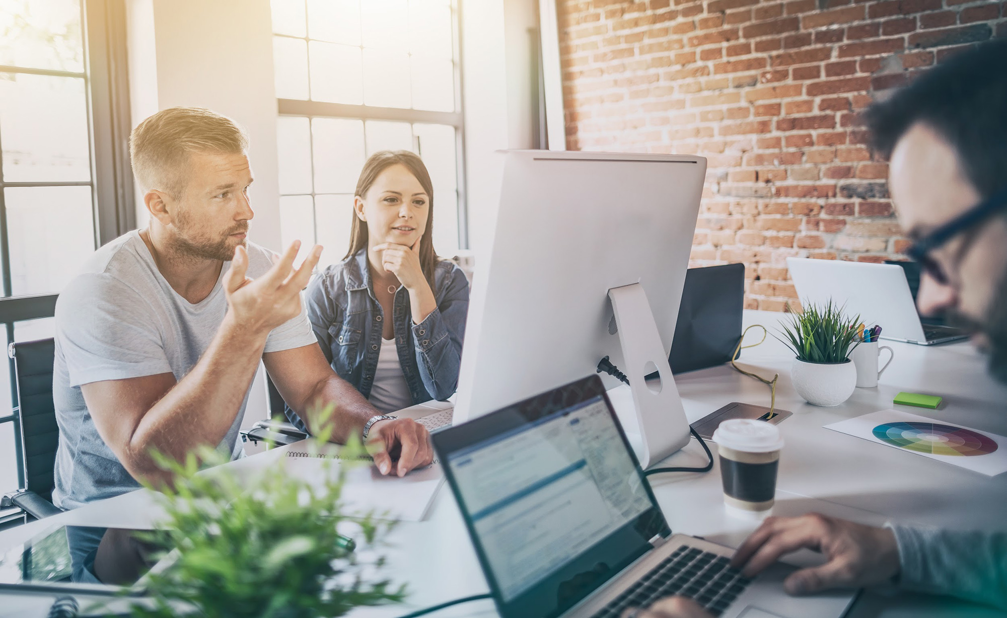 How To Dominate. Employees brainstorming strategies.