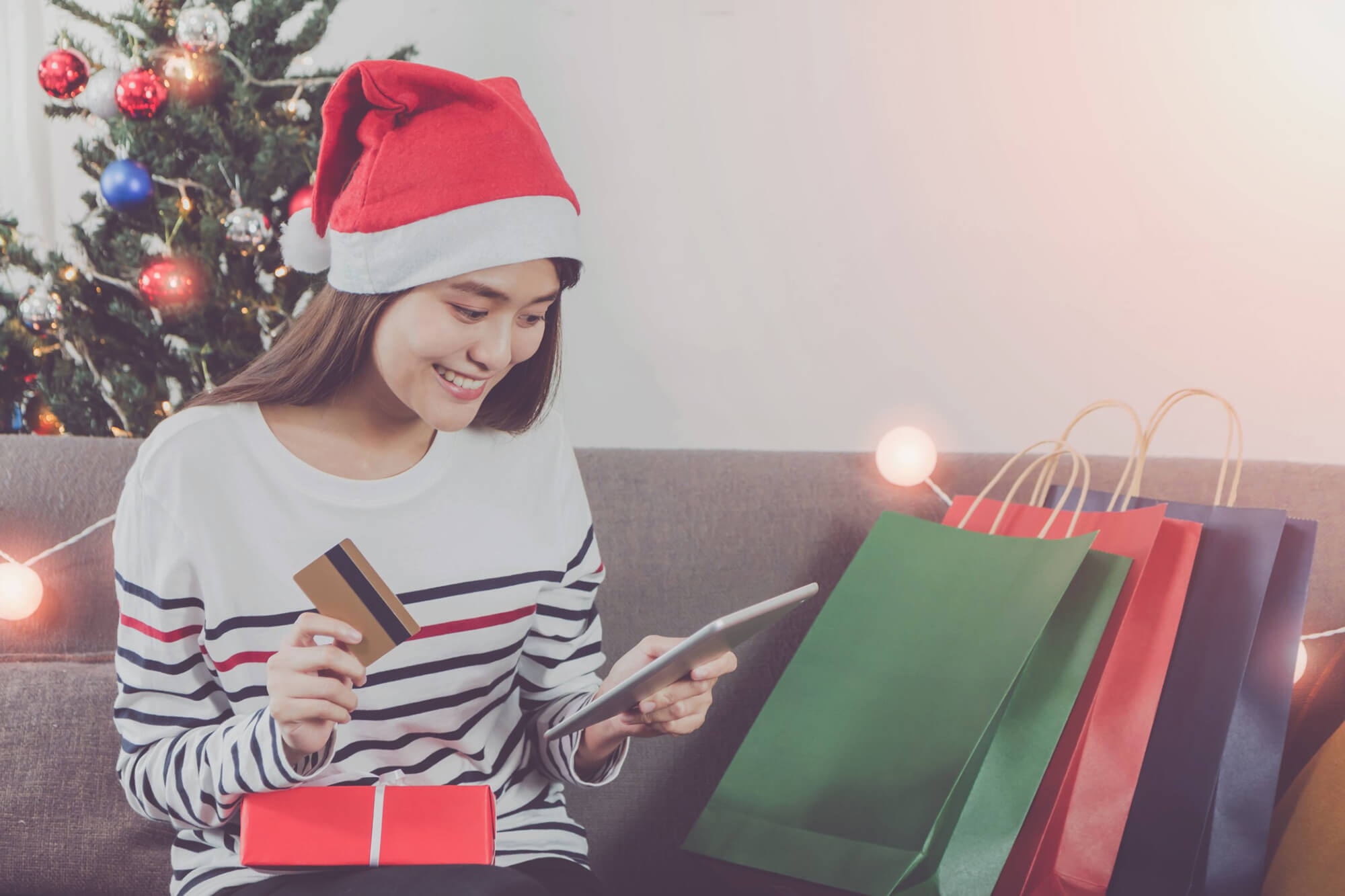 A woman enjoying the holiday eCommerce season.