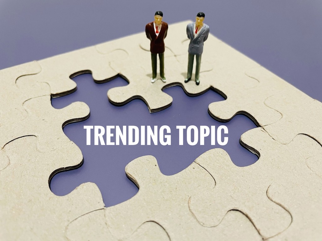 Pick Your Content Cluster Topic | Matchbox Design Group | St. Louis, MO Trending topic written inside of puzzle pieces.