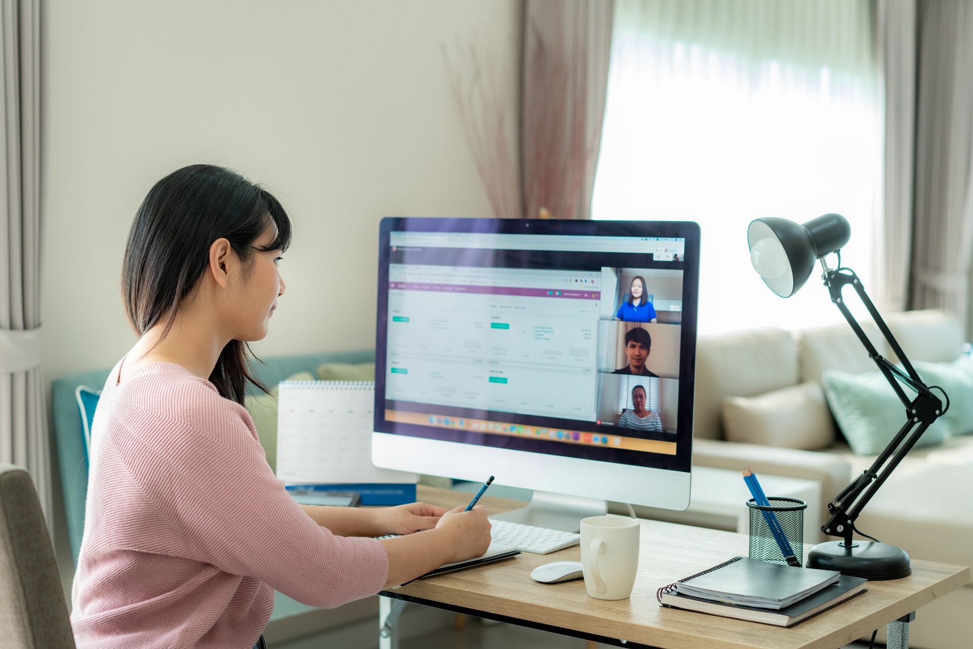 Remote Teams Have Become More Productive. Remote worker on her computer.