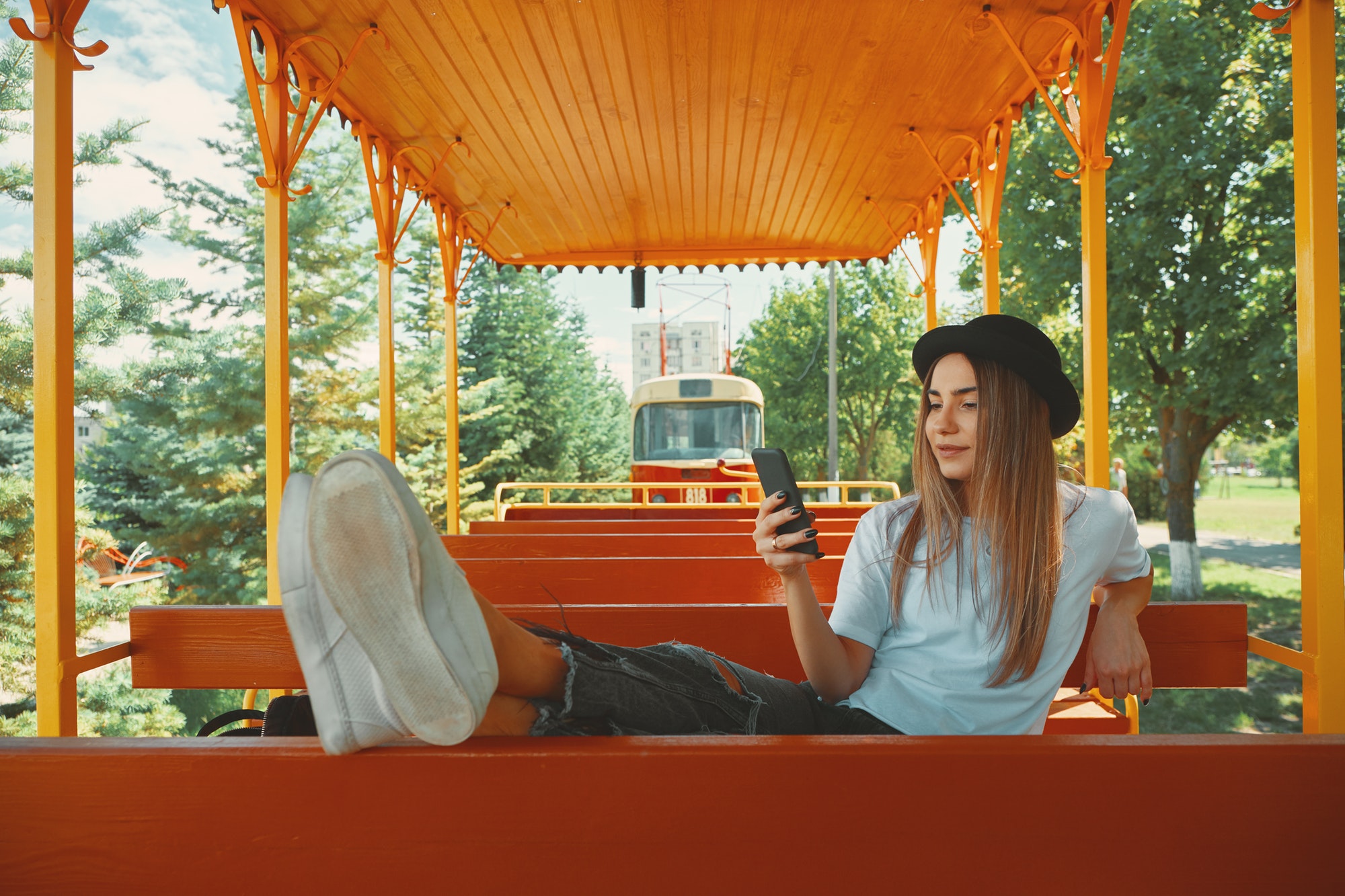 Tips To Make Your WordPress Travel Blog A Success. This girl is taking pics for her blog.