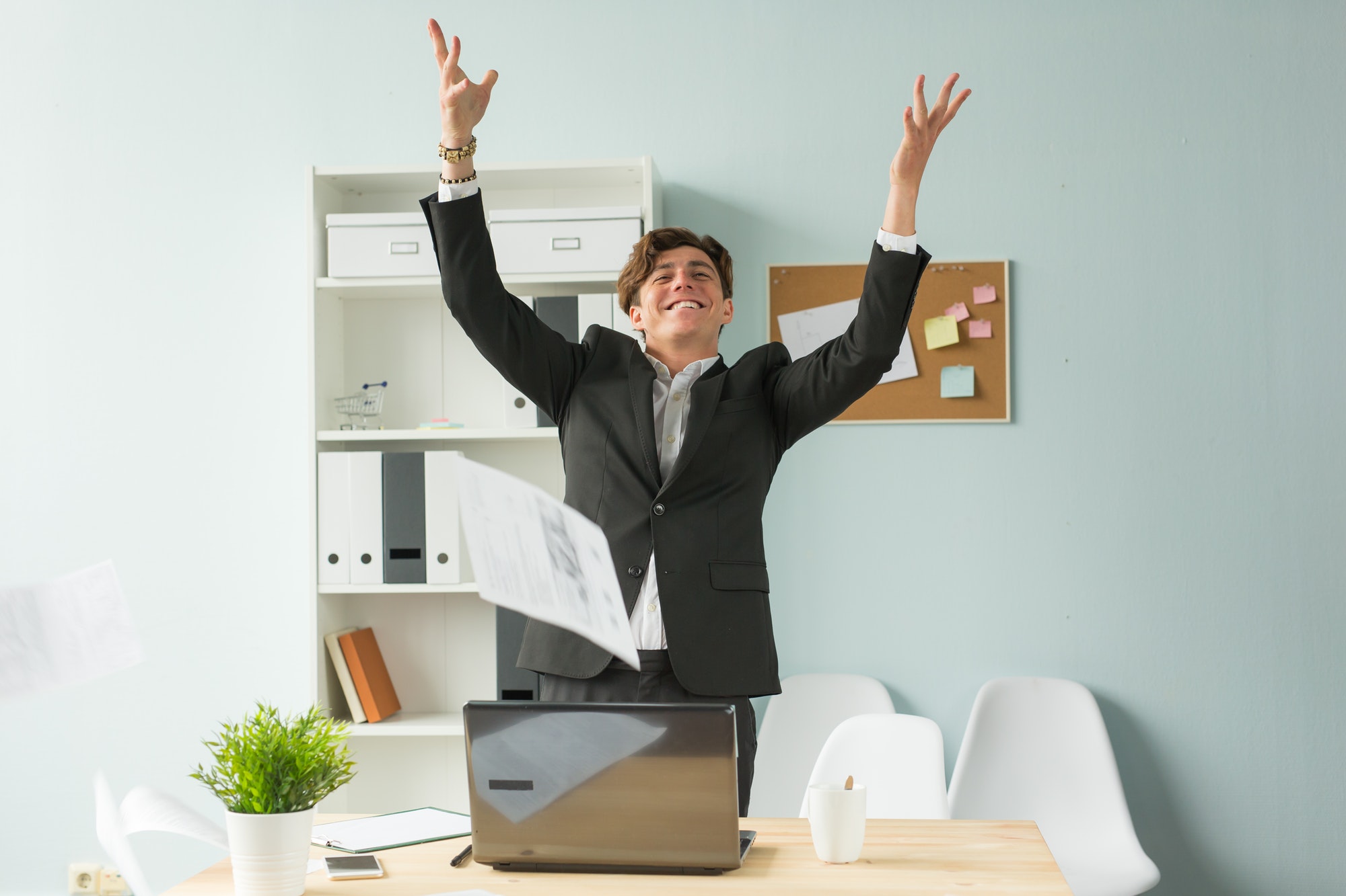 Business man being excited because he knows his worth
