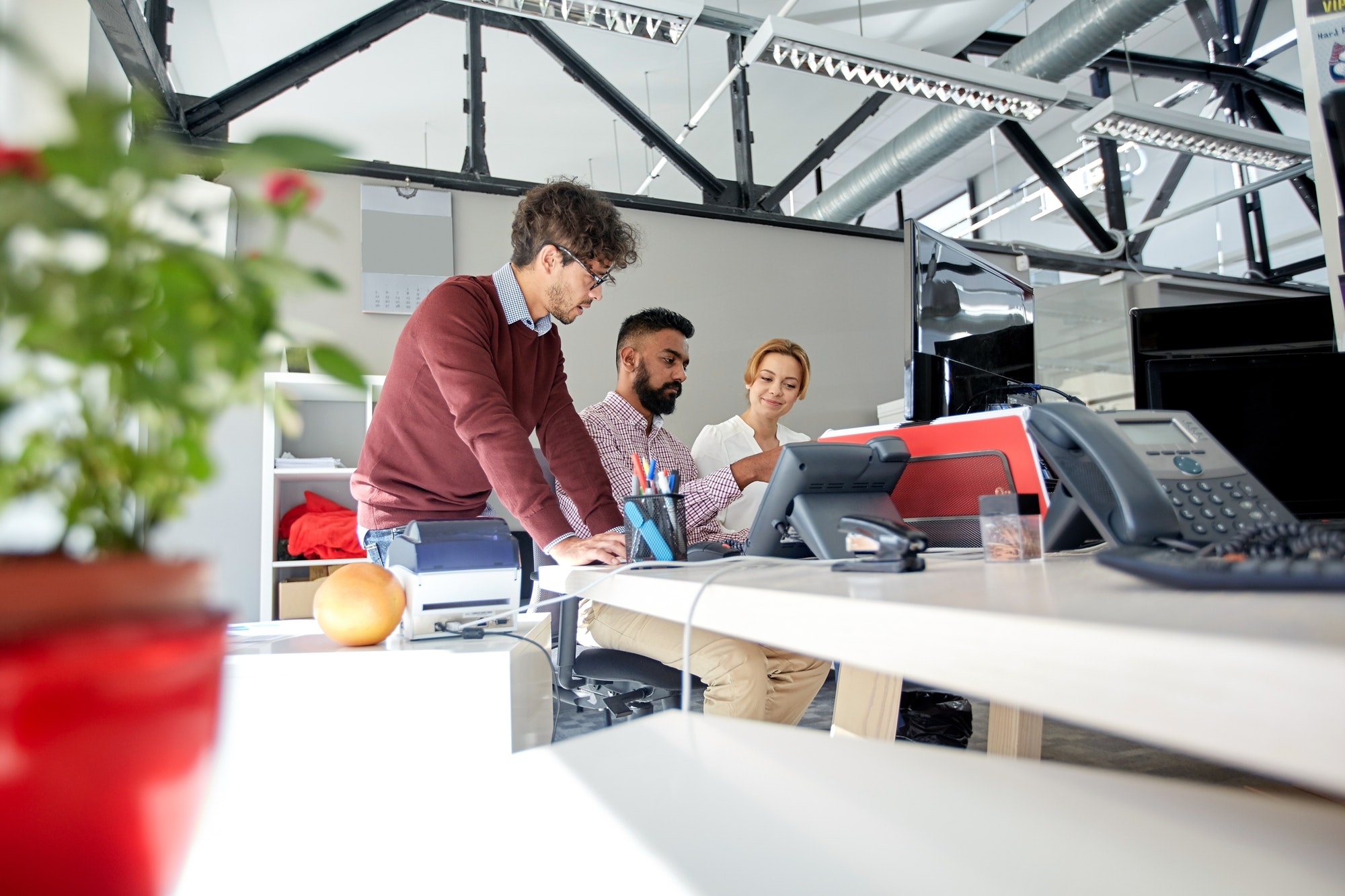 Business team working in office. Personalization helps with customers.