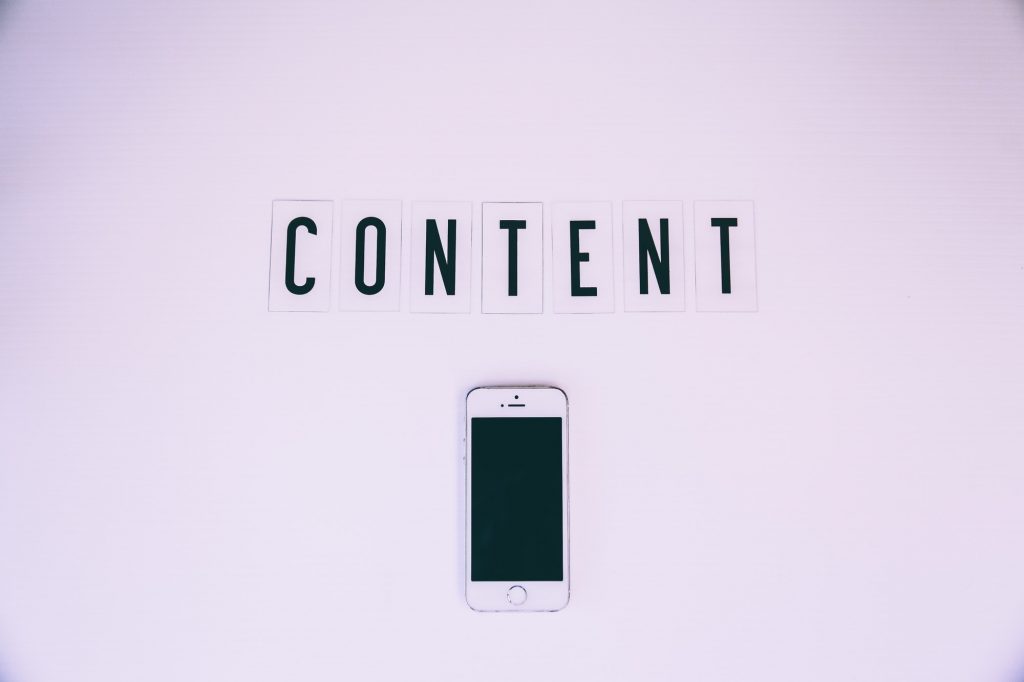 Content Is Part Of SEO | Matchbox Design Group | St. Louis, MO Content written above an iPhone.