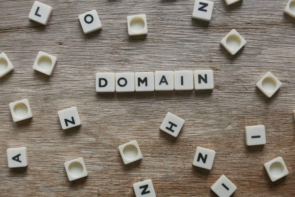 Web Security + Hosting | St. Louis Marketing Agency | Matchbox Design Group The word domain in dominos. Web security + hosting.