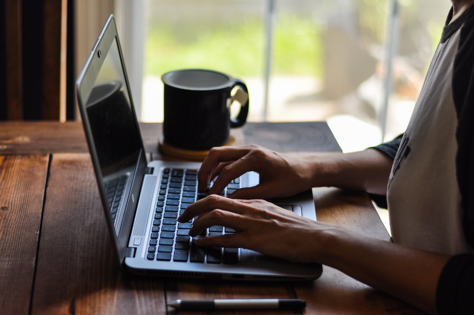 Early morning tea and blogging on a laptop.