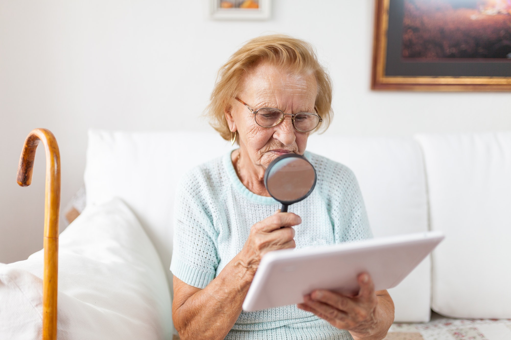 How Can Transcription Services Help | Matchbox Design Group | St. Louis, MO Elderly woman with glasses. A transcript that can be read could help her.