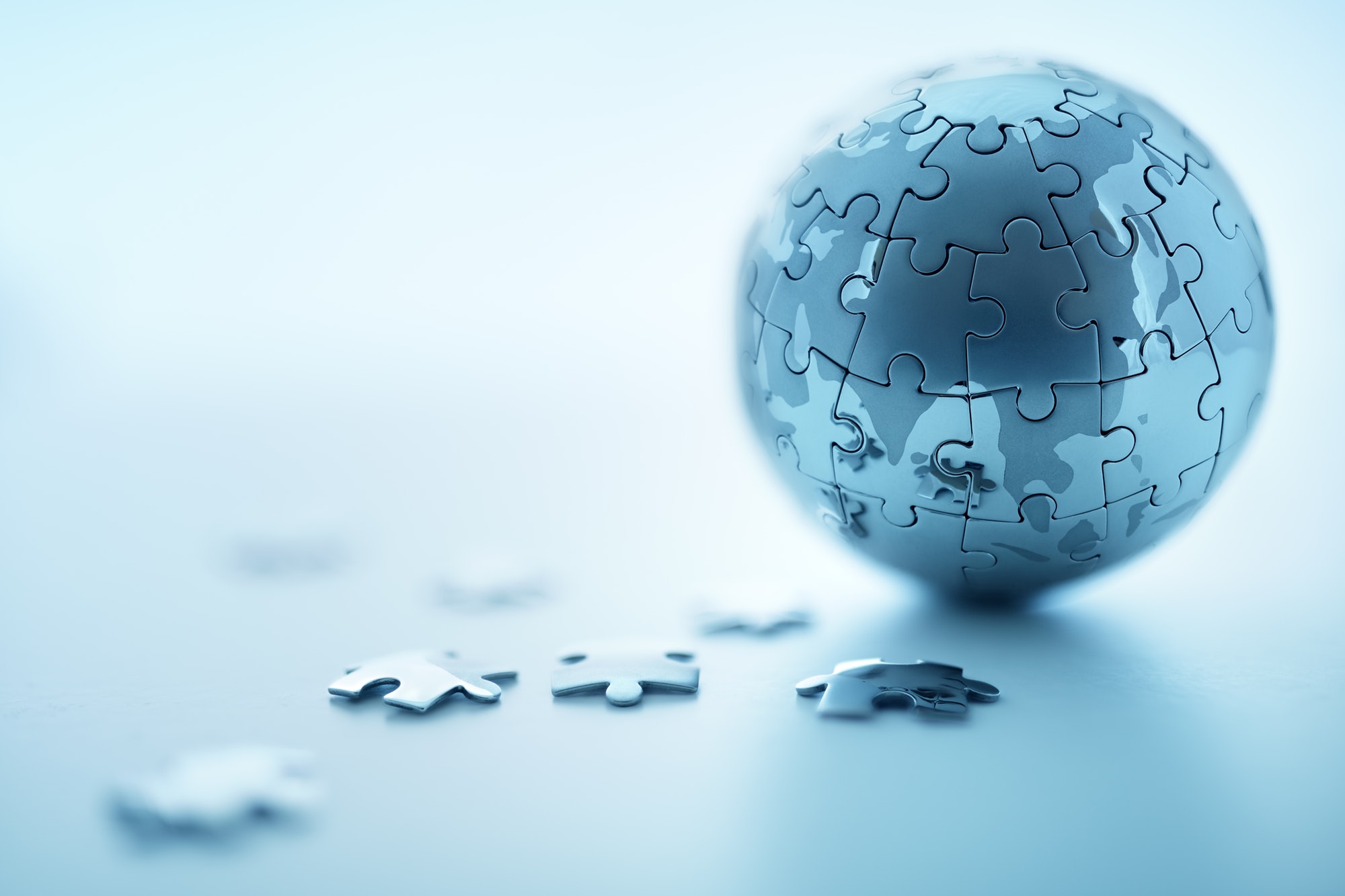 An earth puzzle representing your global brand strategy.