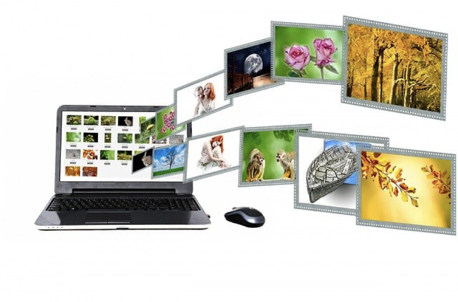 Interactive Content | Matchbox Design Group | St. Louis, MO Images flying out of a computer screen.
