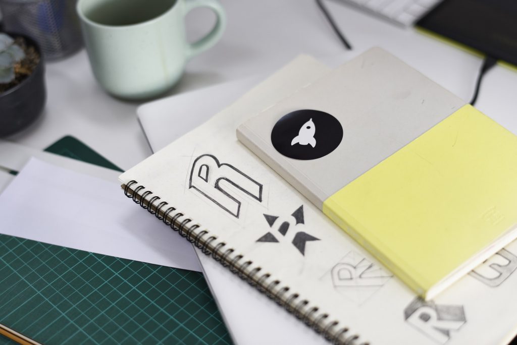 Rebranding Benefits | Matchbox Design Group | St. Louis, MO Notebook With Brand Logo Creative Design Ideas.