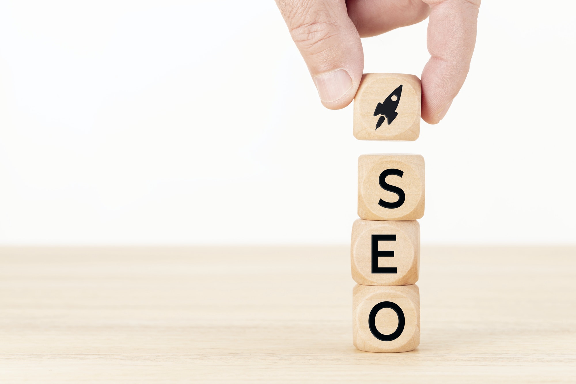 SEO blocks showing a rocket taking off.