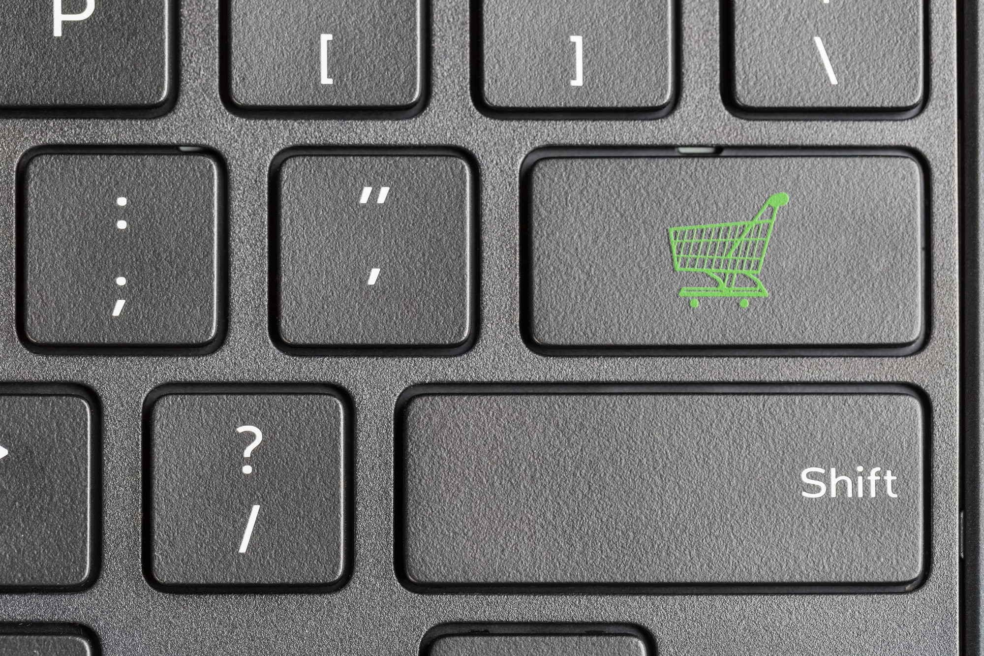 Build Your Online Store | Matchbox Design Group | St. Louis, MO Shopping cart icon on computer keyboard for eCommerce store.
