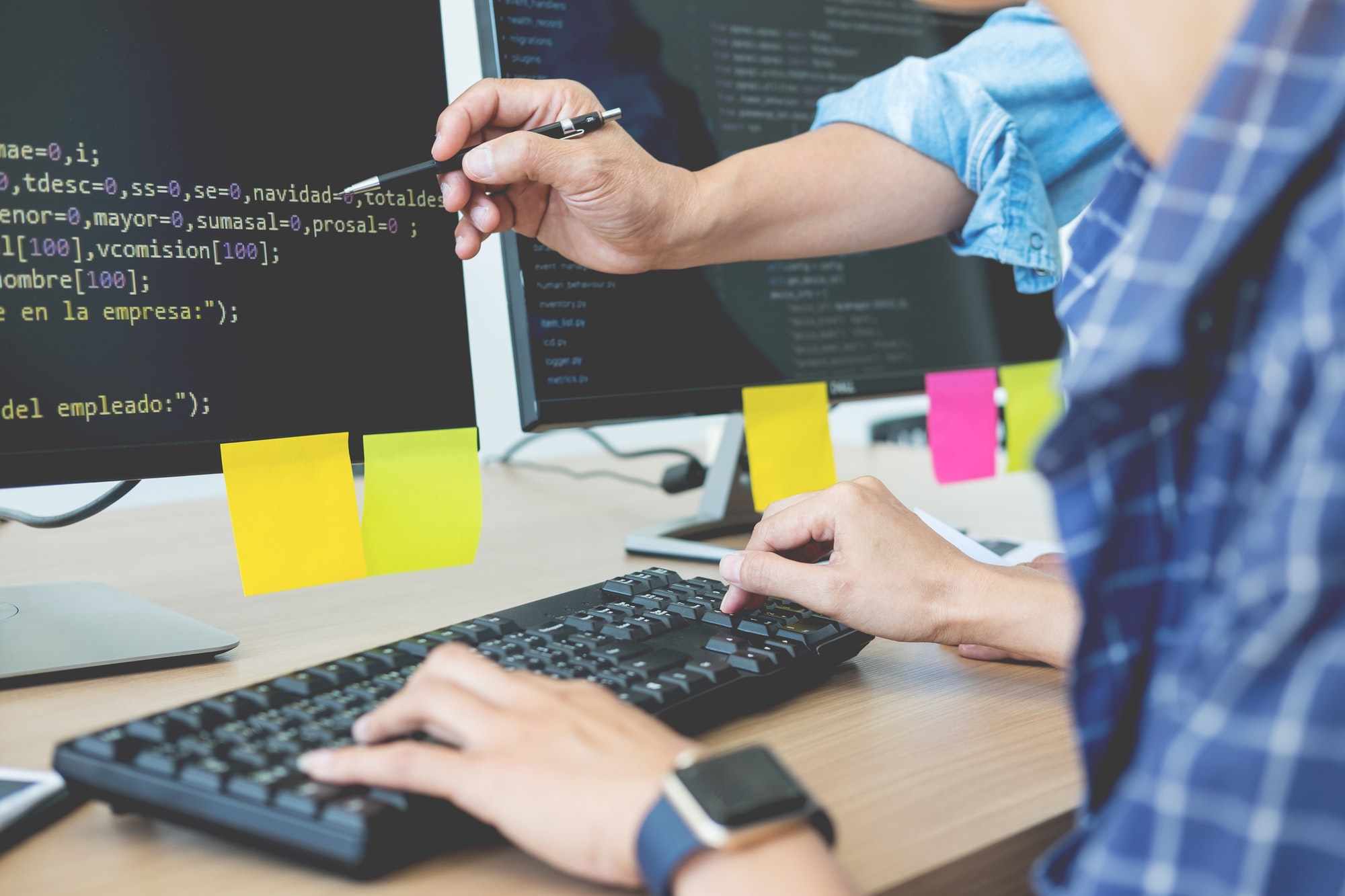 Designer Pointing Out Mistakes. 10 Website Design Mistakes.