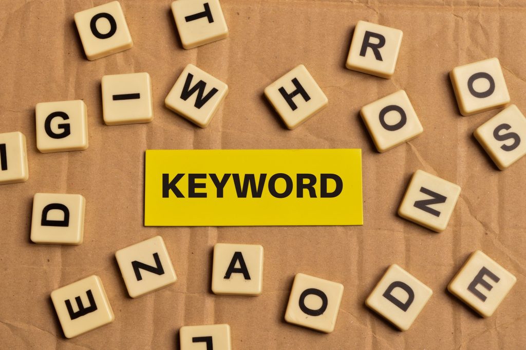 Keyword Stuffing Is A Mistake | Matchbox Design Group | St. Louis, MO Keyword written with other scrabble letters surrounding it.