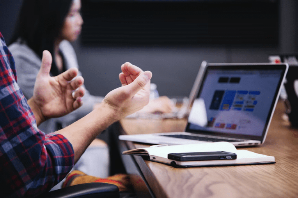 Keeping Ethics In Mind When Creating Your Marketing Strategies | Matchbox Design Group People in a meeting keeping ethics in mind when creating your marketing strategies.