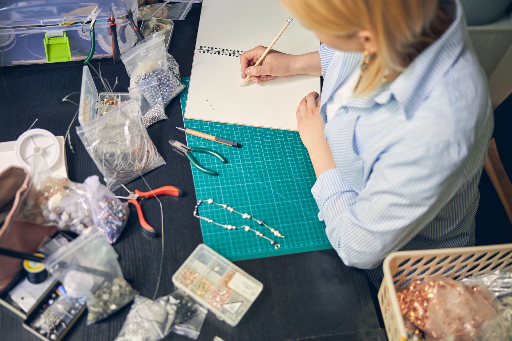 Woman creating a product design. Understanding the product design process.