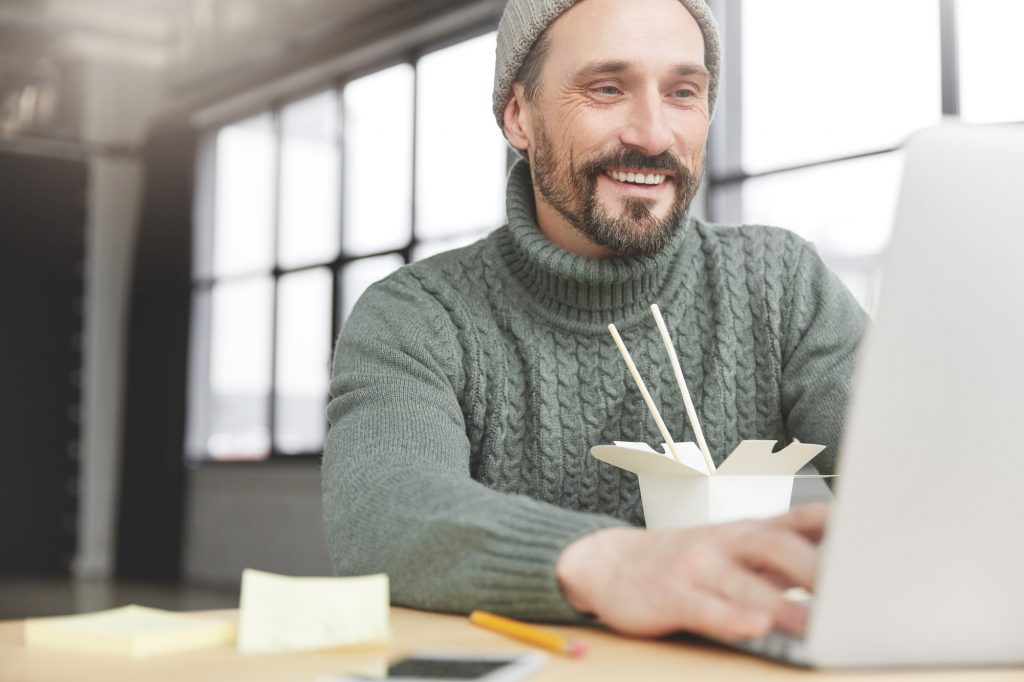 Introduce Your Company And What It Stands For | Email Marketing | Matchbox Design Group Man looking at an email introducing a company.