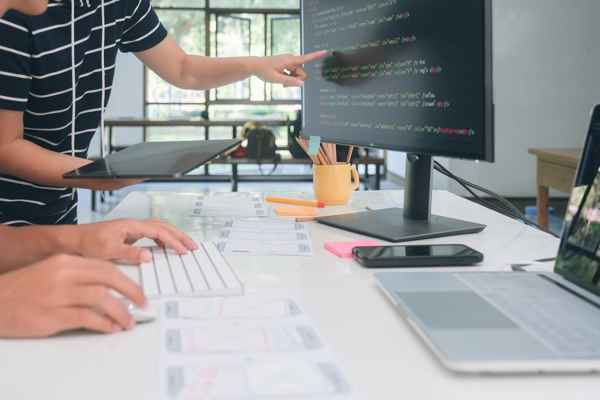 SEO and web design team working together.