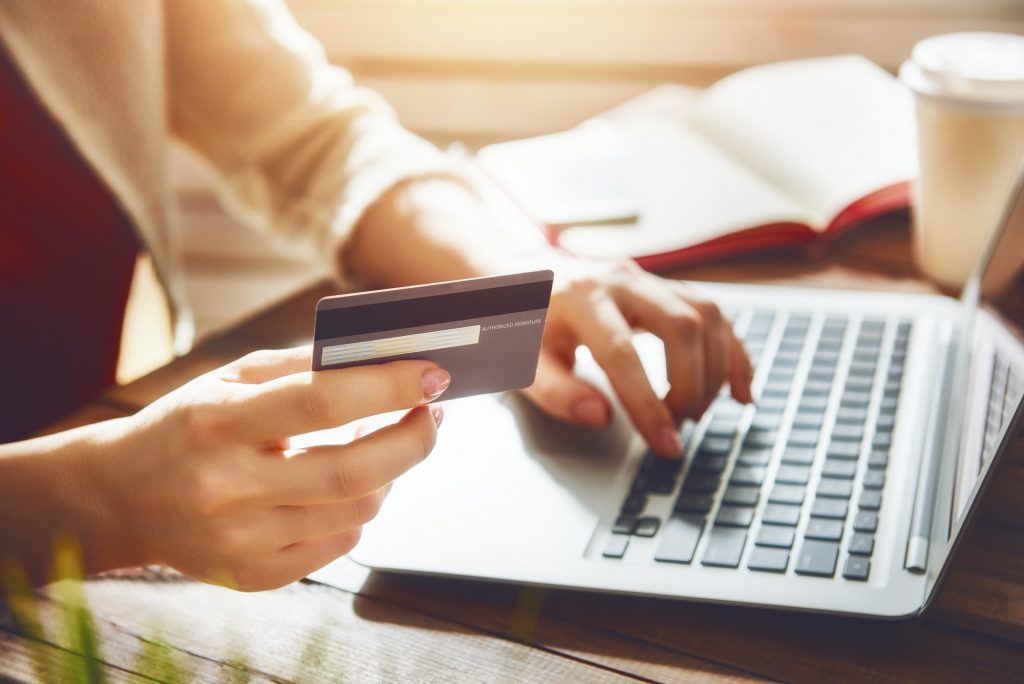 Online Shopping | St. Louis eCommerce | Matchbox Design Group | St. Louis, MO A person shopping online.