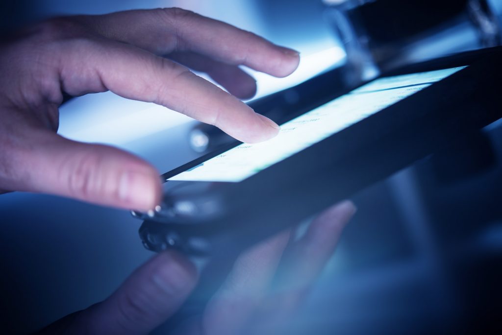 The Top Mobile App Development Trends To follow In 2022 | Matchbox Design Group In St. Louis, MO Using Mobile Smartphone App.