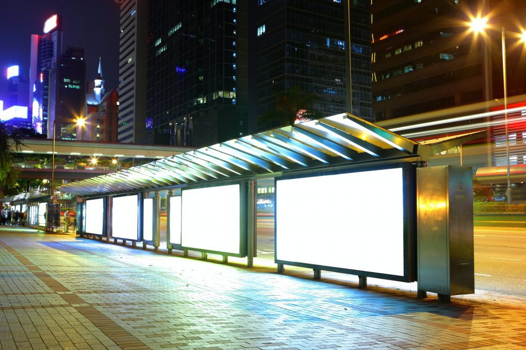 Billboards Influence Purchasing Decisions | Matchbox Design Group In St. Louis, MO Blank billboard on bus stop at night.