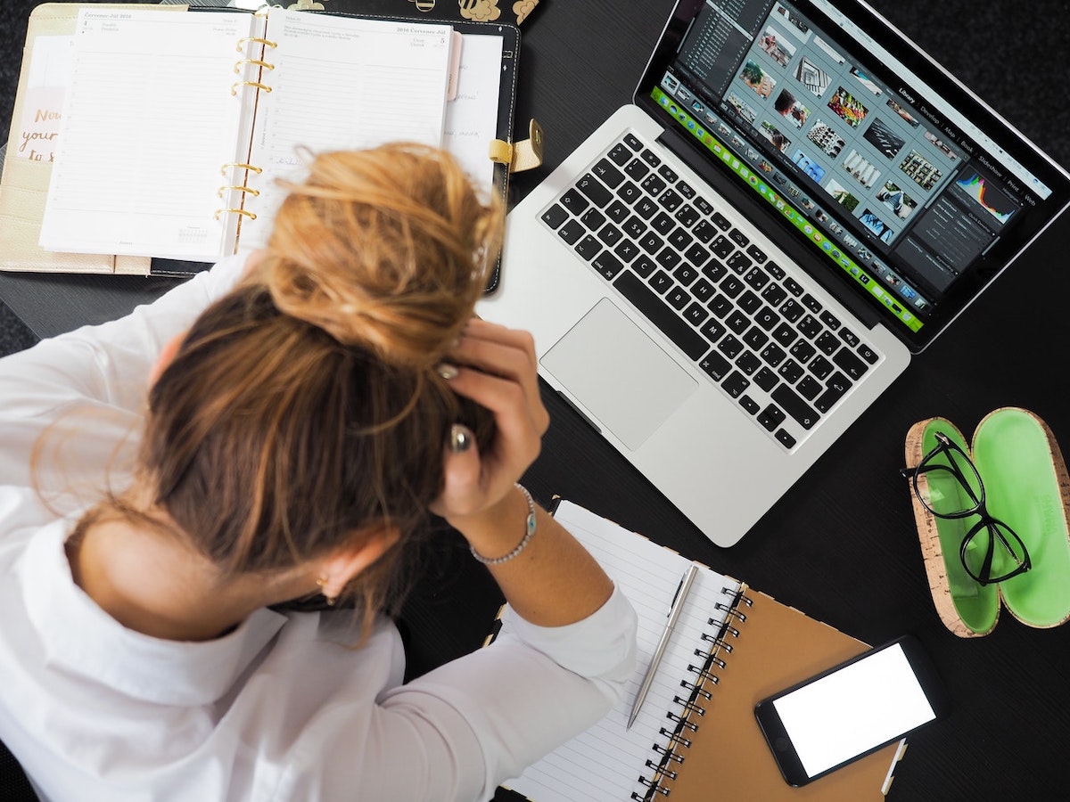 Woman Adopting Technology To Address Business Pain Points.