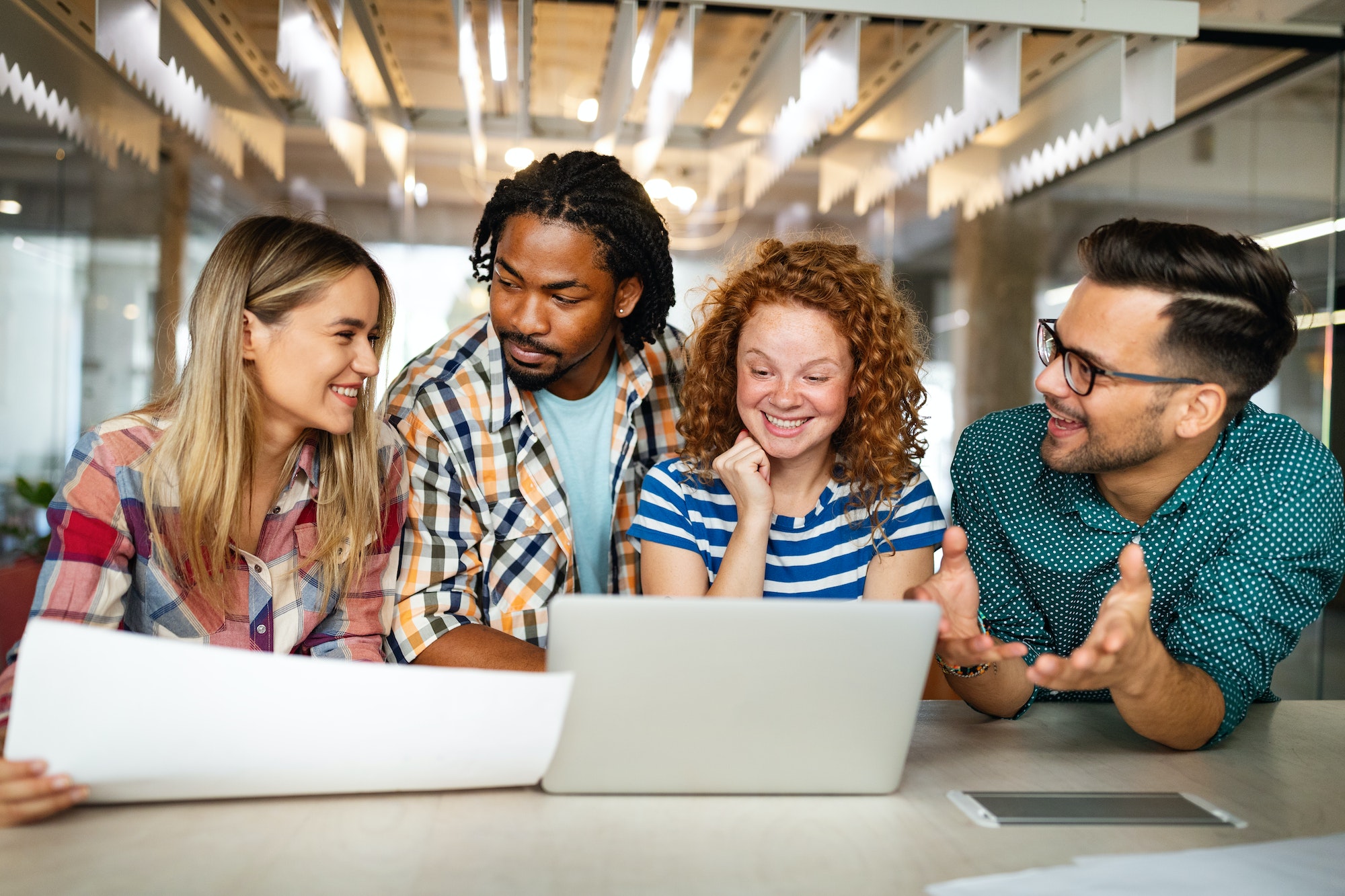 Creative professional discussing website design ideas.