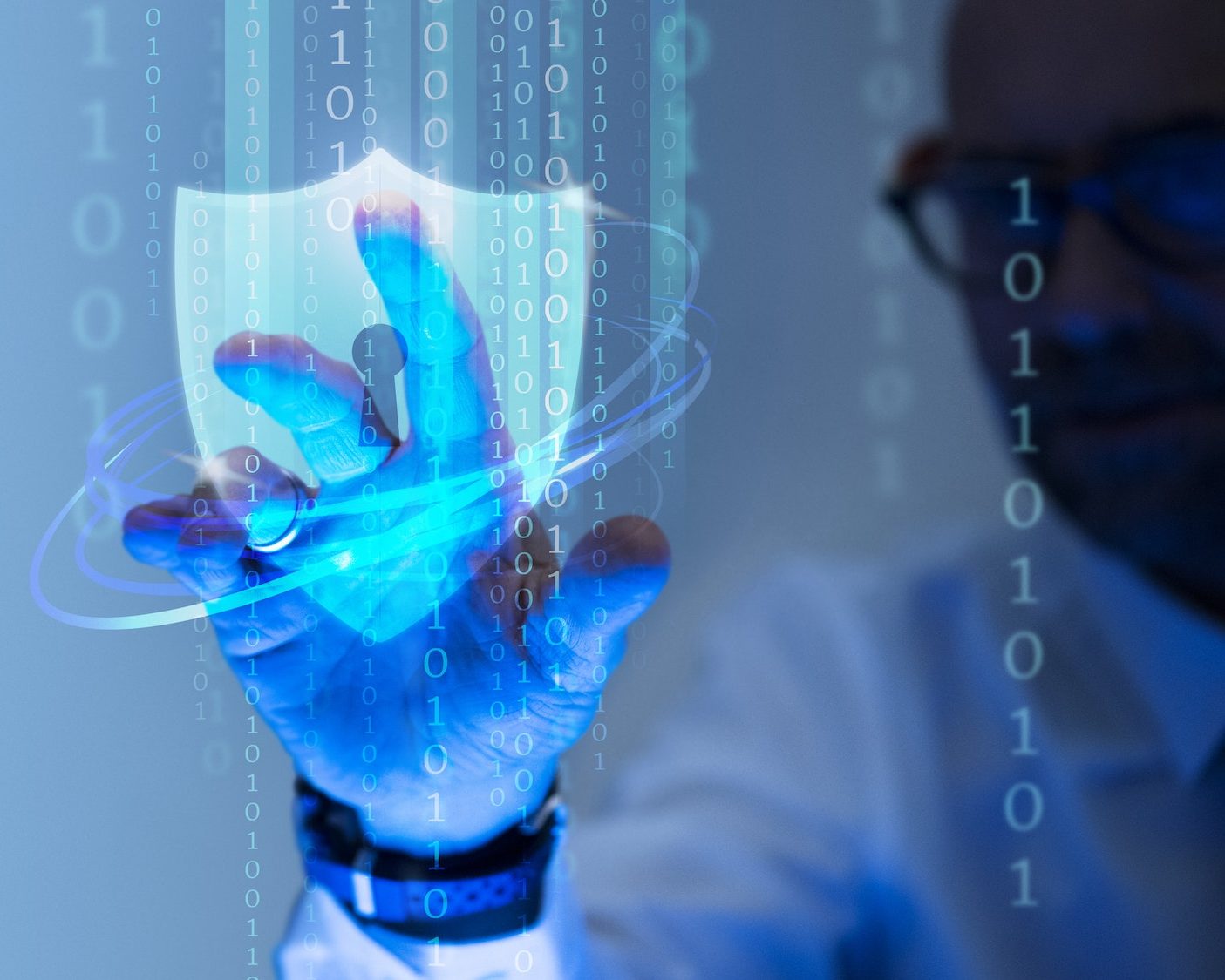 Man touching digital blue shield and code representing data privacy regulations