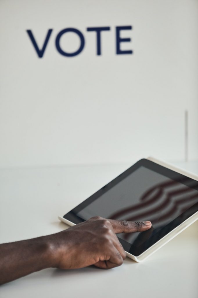 Blockchain Technology For Online Voting | Matchbox Design Group | St. Louis, MO Man voting online with blockchain technology