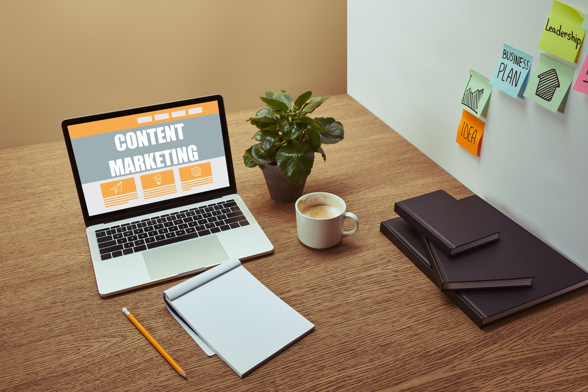 Laptop with content marketing written on the screen.