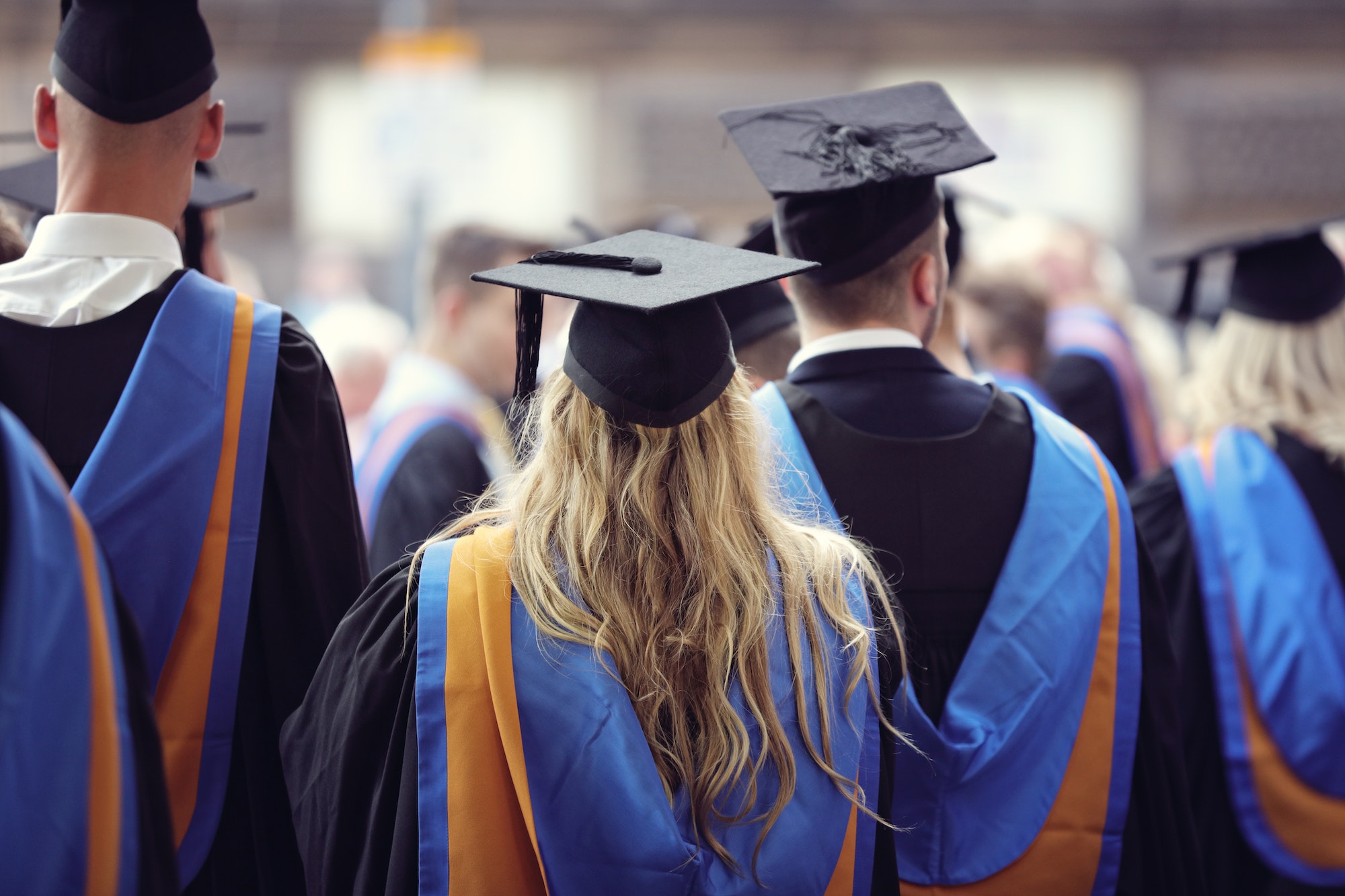 A group about to walk for their master's In marketing.