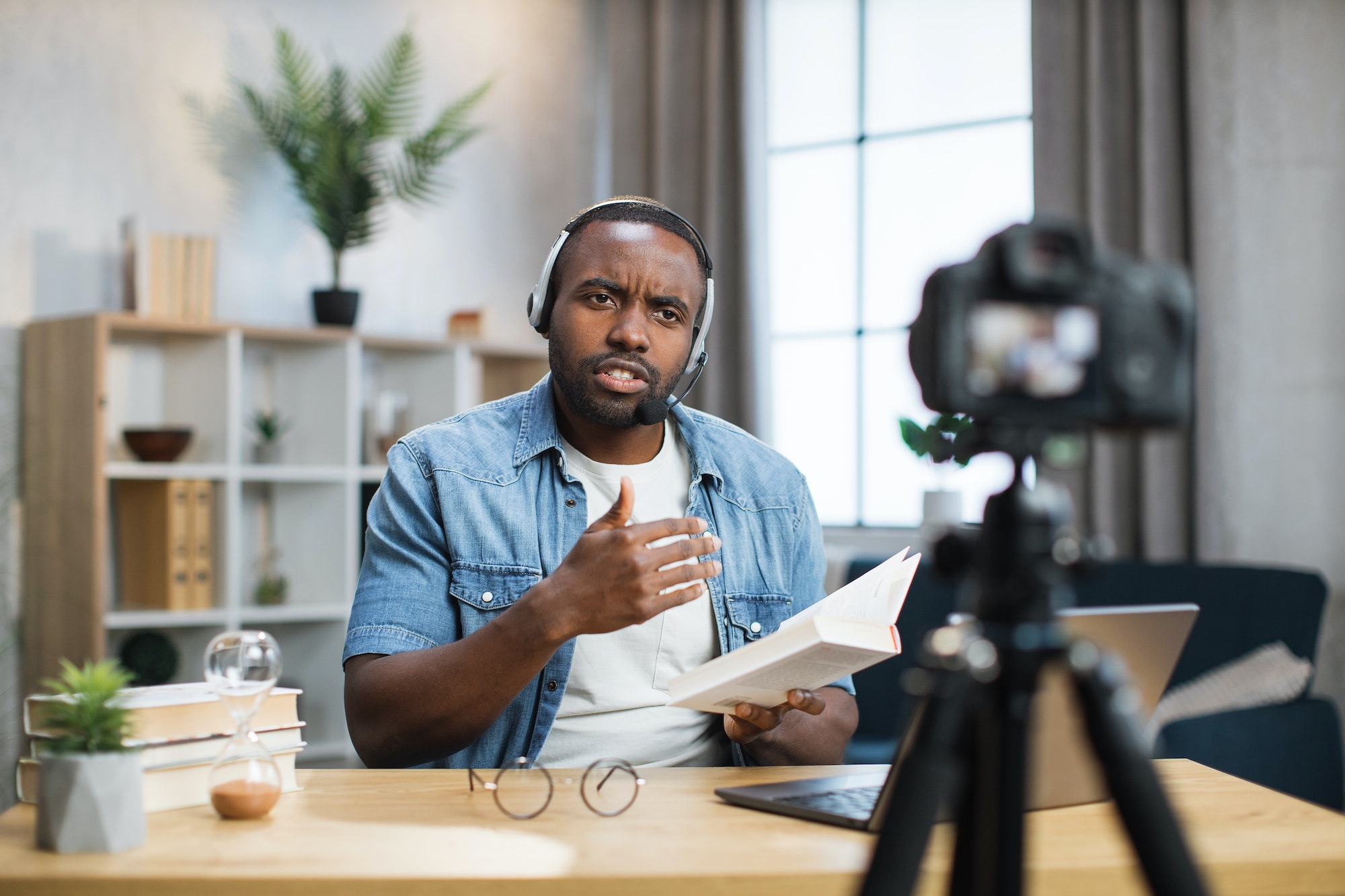 African American man live streaming.