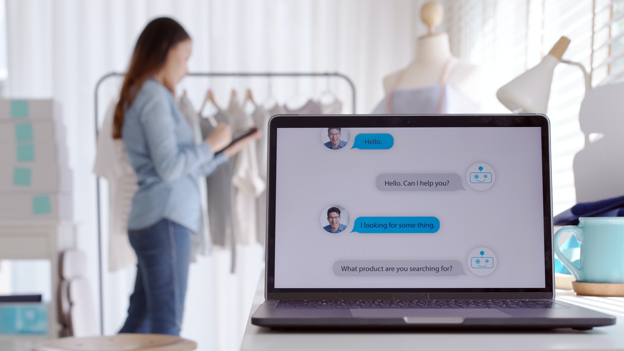 Chatbot conversation on laptop screen.