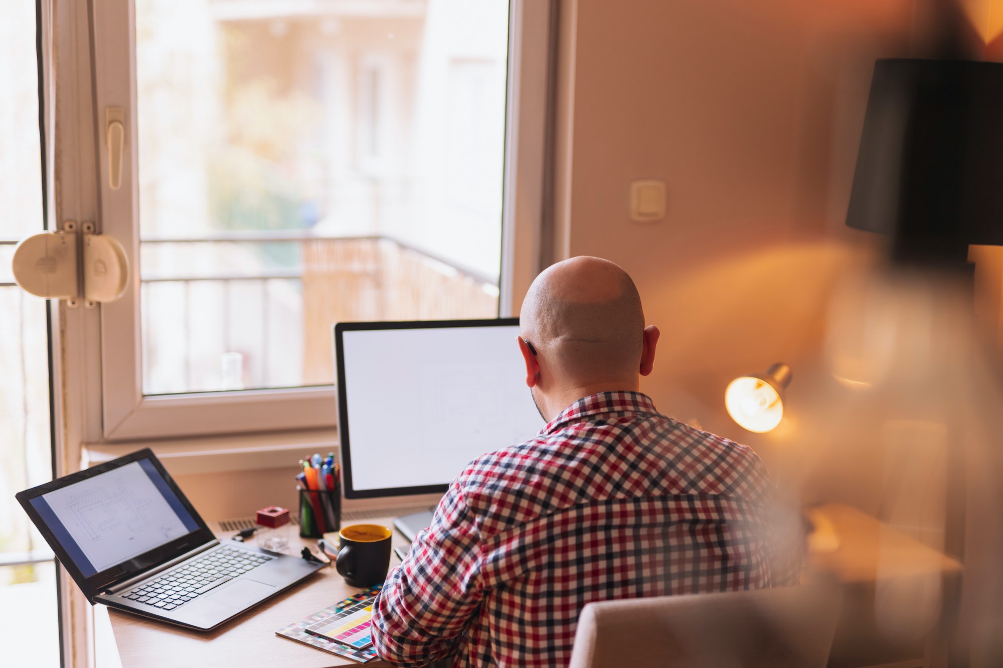 Web developer working remotely from home.