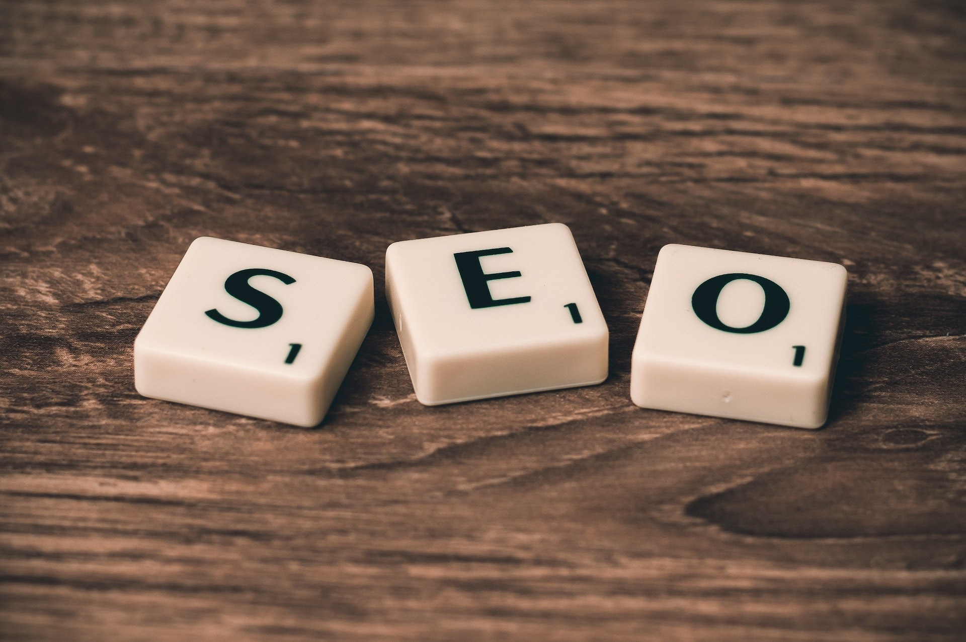 three scrabble tiles forming “SEO”