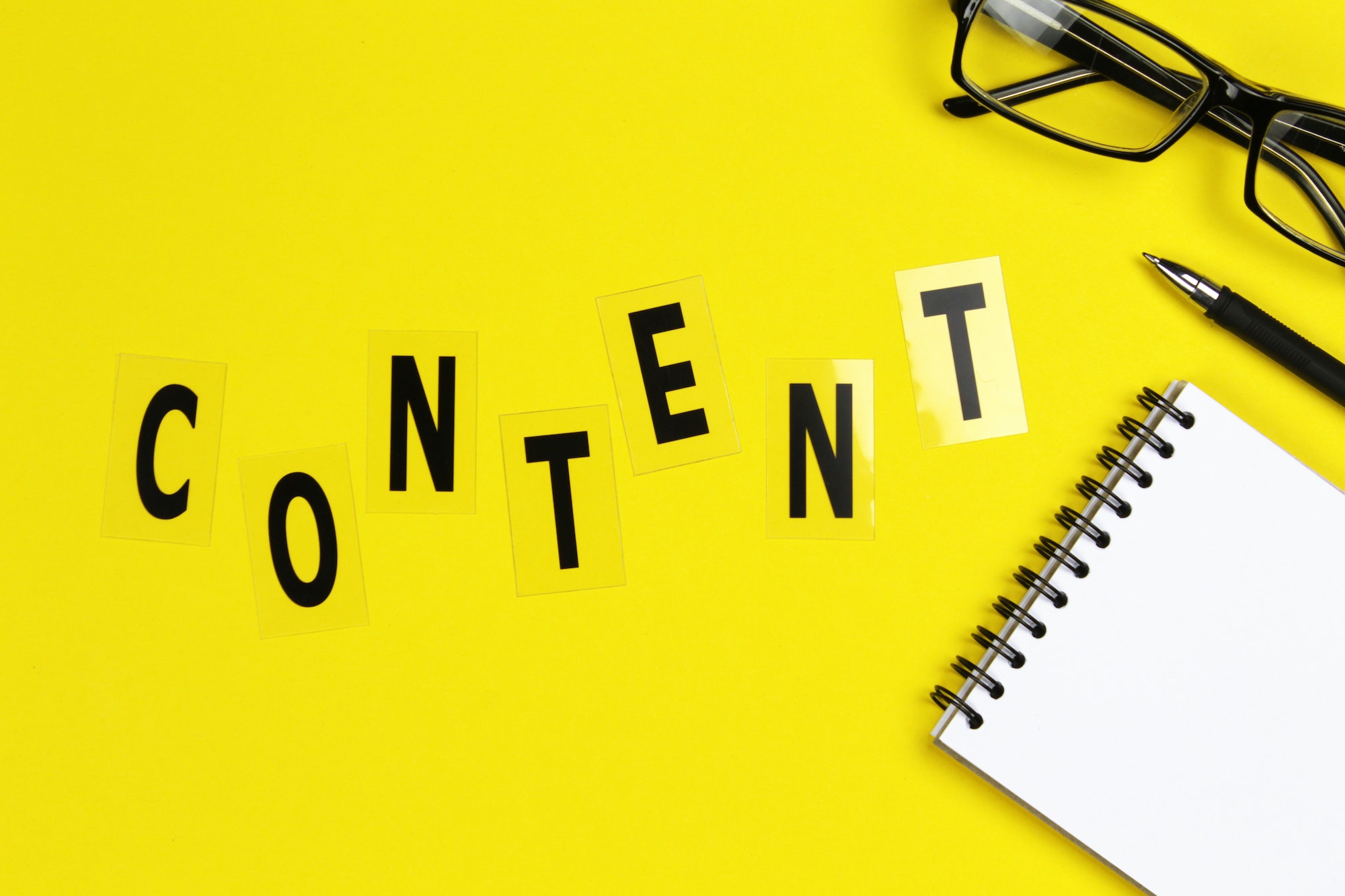 Content word on yellow. A Guide To Content Optimization.