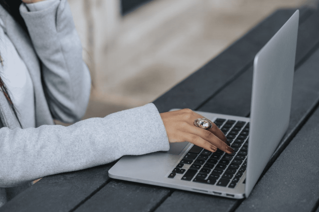 The Key Benefits Of SEO | Matchbox Design Group | St. Louis, MO Woman using SEO and online education to stay competitive in business.