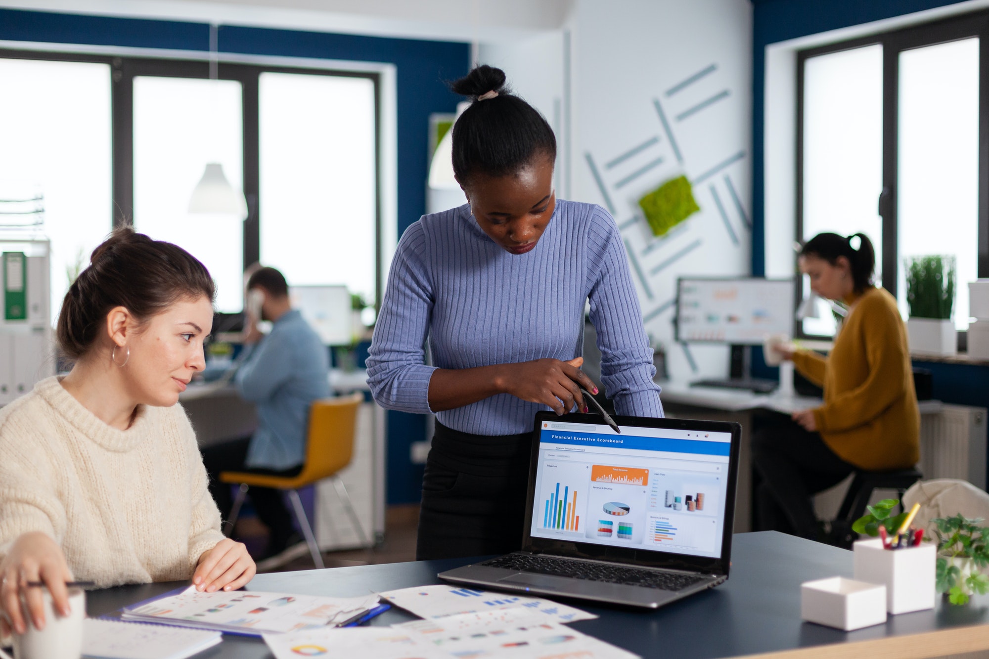 Effective Branding Tactics For Startup Agencies. 2 people working together.