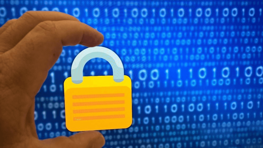 A padlock placed over strings of data - Matchbox Design Group A padlock placed over strings of data