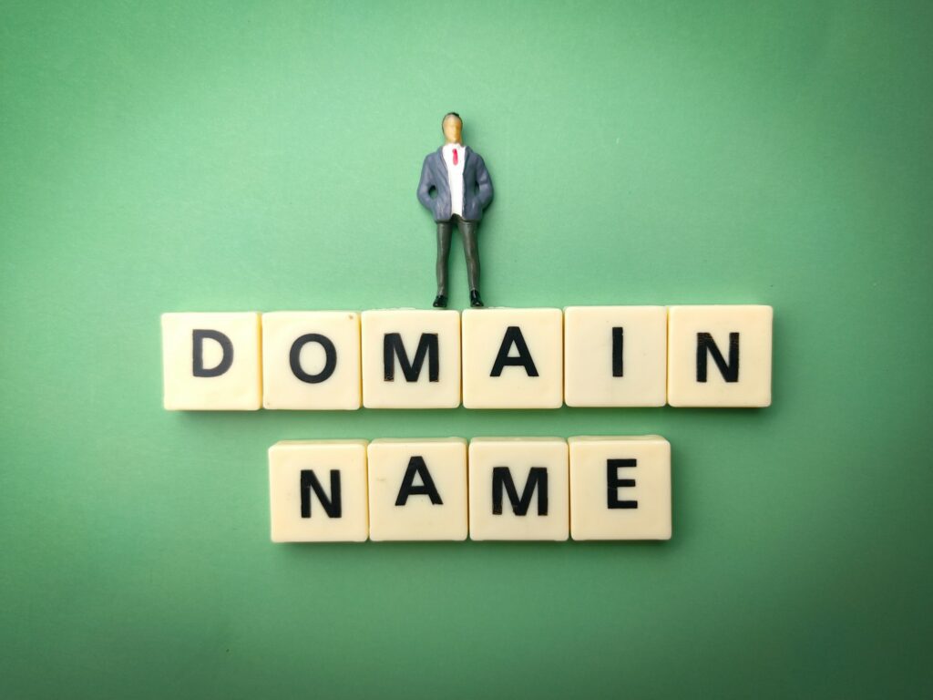 9 Ways To Fix The DNS_PROBE_FINISHED_NXDOMAIN Error | Matchbox Design Group 9 Ways To Fix The DNS_PROBE_FINISHED_NXDOMAIN Error. Man standing on Domain Name blocks.