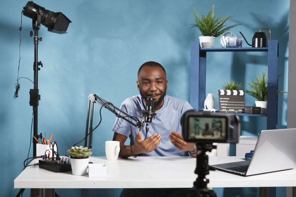 Create Compelling Content | Matchbox Design Group | St. Louis, MO Blogger creating content with camera