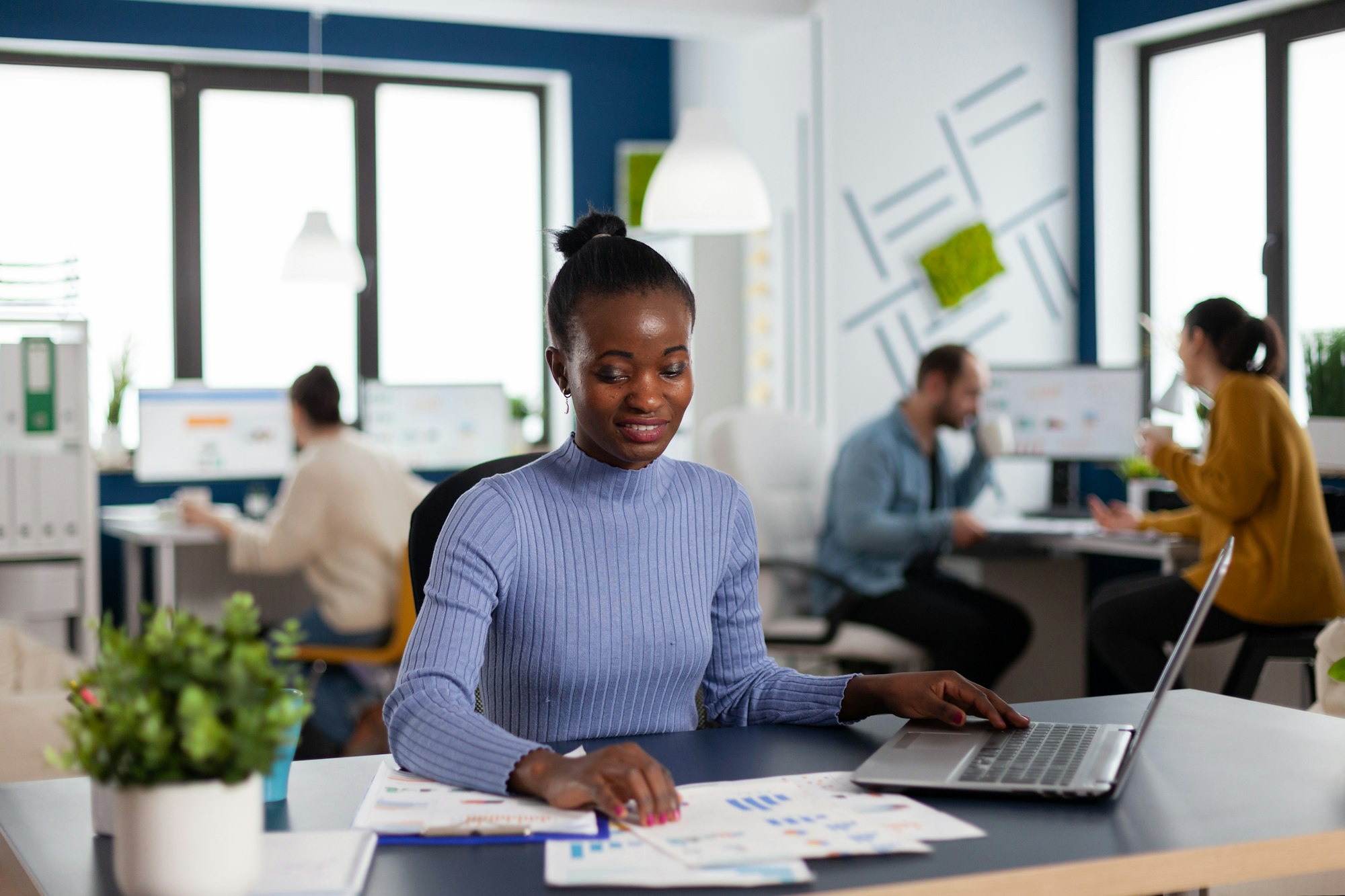 Woman working in her full service marketing agency.
