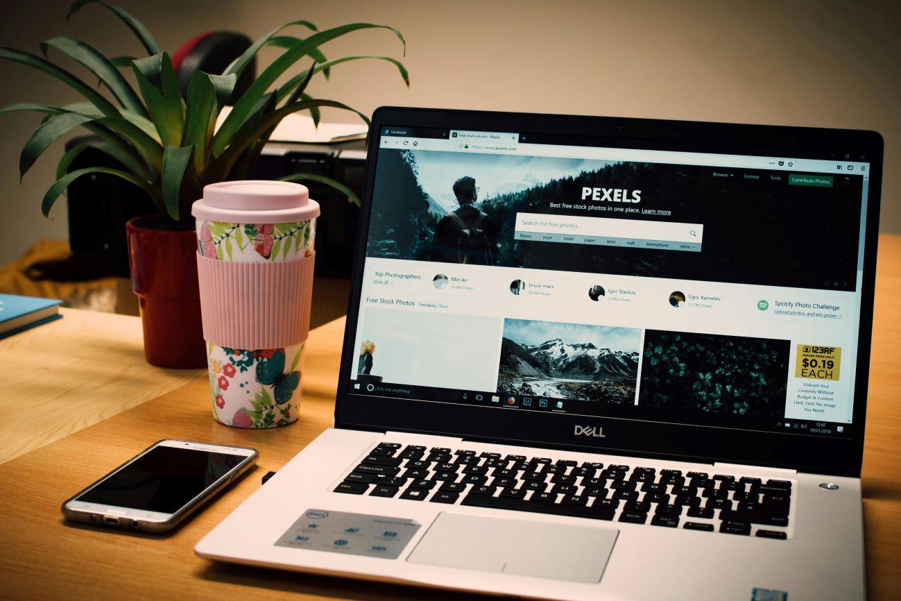 Photo of a Gray Dell Laptop Displaying Pexels Webpage | Matchbox Design Group | St. Louis, MO Photo of a Gray Dell Laptop Displaying Pexels Webpage.